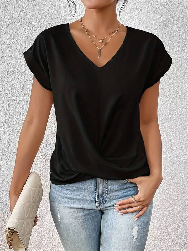 Kaira - Modieus top met V-hals en twistdetail