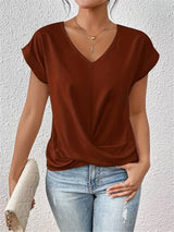 Kaira - Modieus top met V-hals en twistdetail