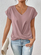 Kaira - Modieus top met V-hals en twistdetail