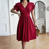 Eleganza™ – Dames midi jurk met V-hals voor elegante gelegenheden