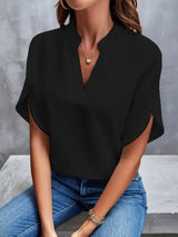 Isalie – Elegante V-halsblouse met vloeiende stof