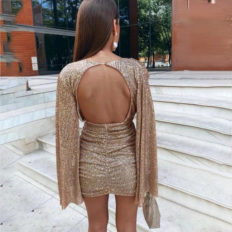 Glitterjurk met V-hals