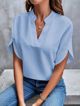 Isalie – Elegante V-halsblouse met vloeiende stof