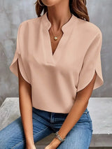 Isalie – Elegante V-halsblouse met vloeiende stof