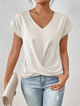 Kaira - Modieus top met V-hals en twistdetail