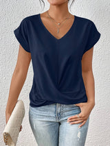 Kaira - Modieus top met V-hals en twistdetail