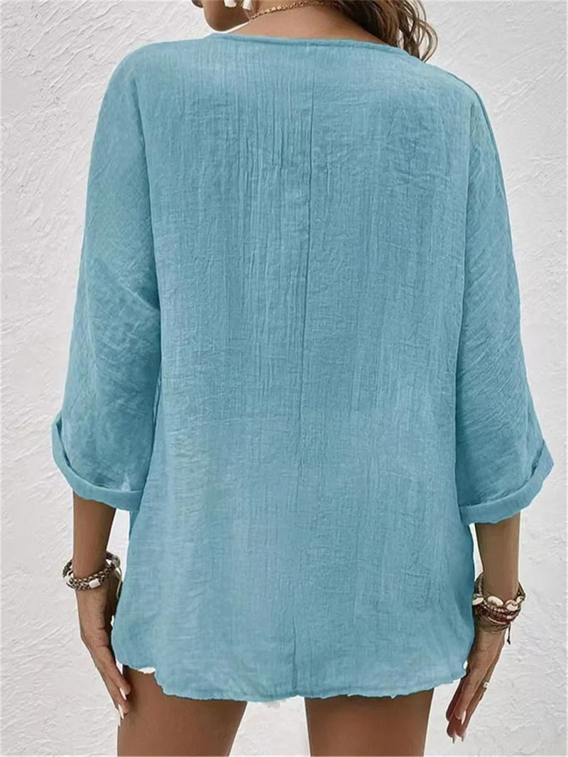 Fayo - Eenvoudige blousetop met V-hals en knoopsluiting