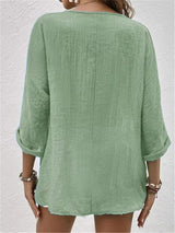 Fayo - Eenvoudige blousetop met V-hals en knoopsluiting